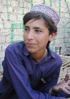 Afghan boy flees to Pakistan, recounts air strikes